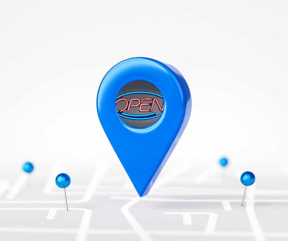 Blue local business pin with open sign illustrating growth-focused Local SEO services in Michigan